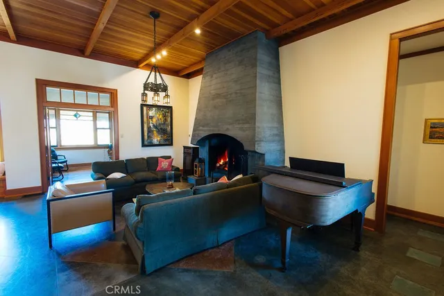 a view of a dining room with furniture and window