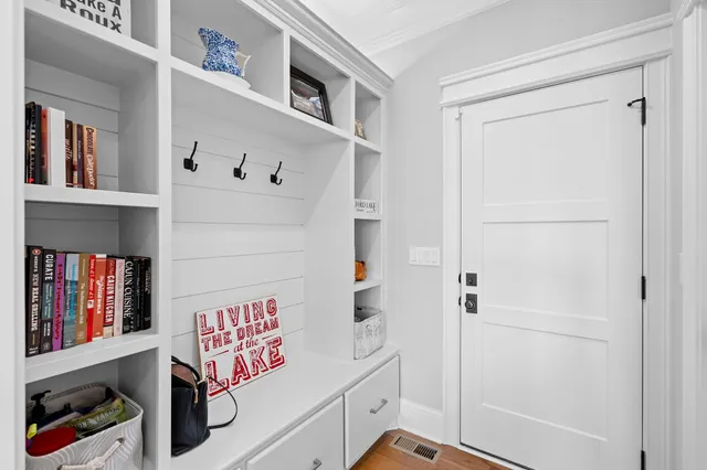 a utility room with closet dryer and washer