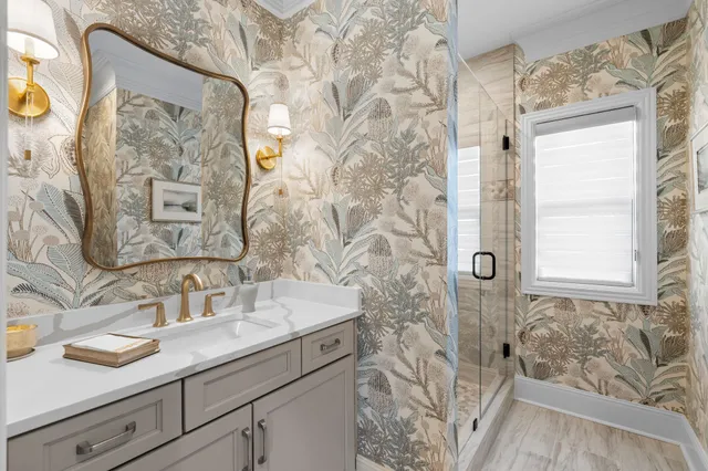 a bathroom with a sink and a mirror