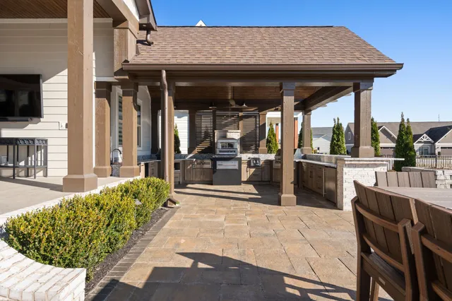 a front view of a house with swimming pool