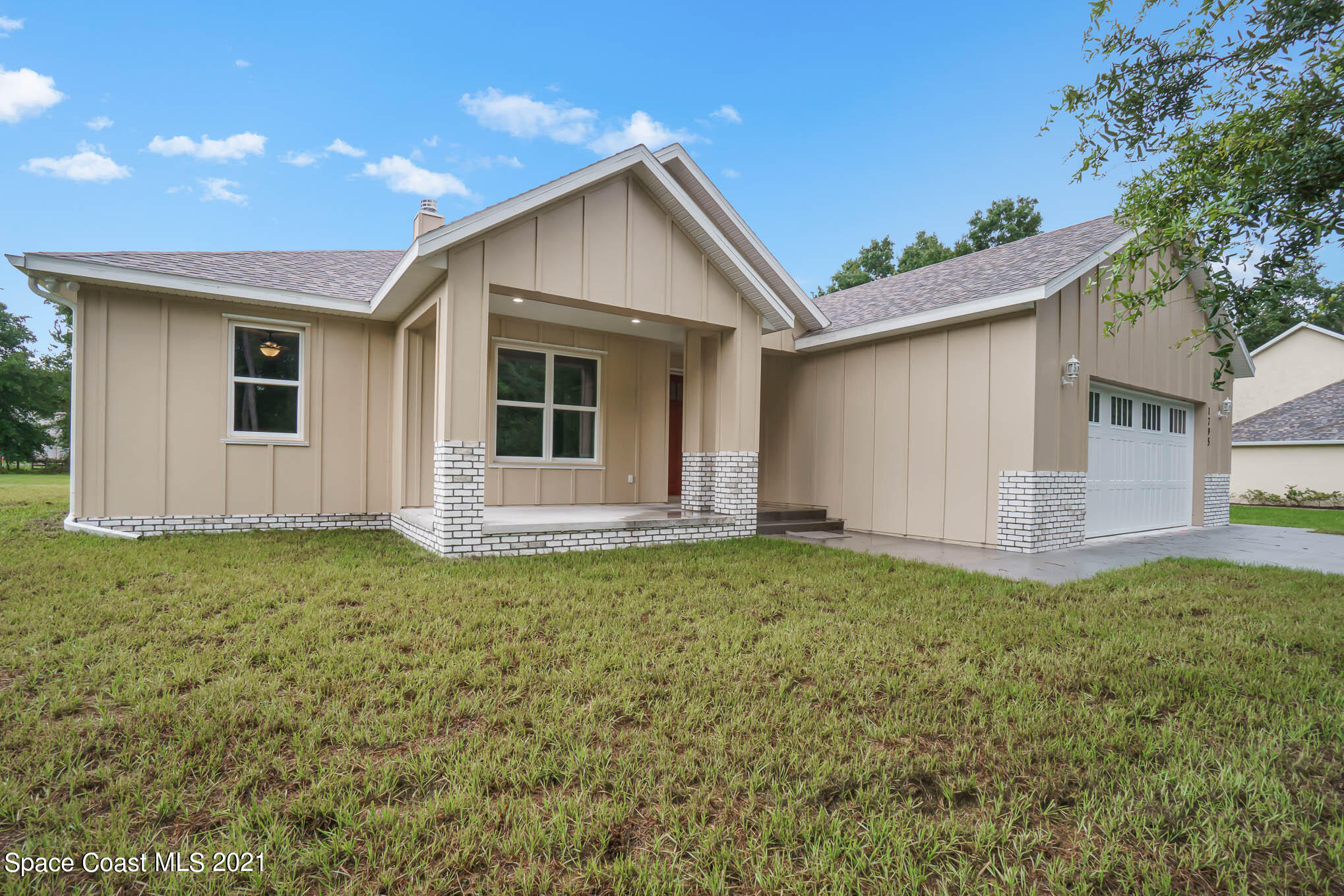 1795 Turpentine Road Mims, FL 32754 - Photo 3 of 35 Spaur1795TurpentinePhotoPack_54-Edit