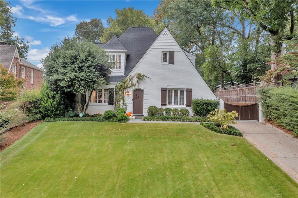 2741 Atwood Road Northeast Atlanta, GA 30305 - Photo 1 of 1 a front view of a house with a yard