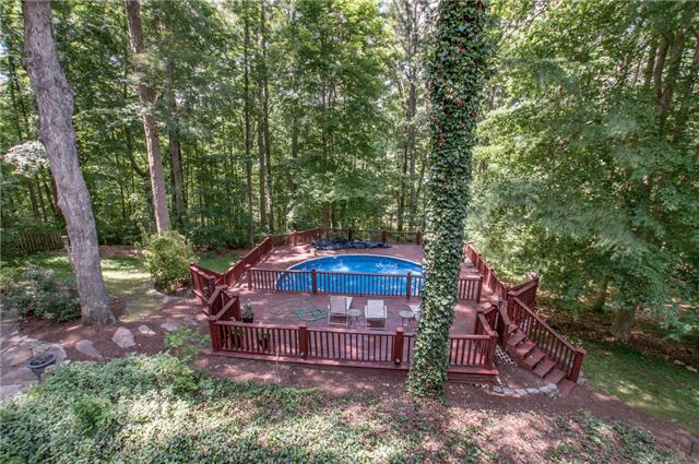 107 Spring View Place Cottontown, TN 37048 - Photo 17 of 20 Relax in the Pool with spacious sun deck and nearby fountain. Landscape lighting and a fountain are additional features that make this pool a great place for family and friends day or night.