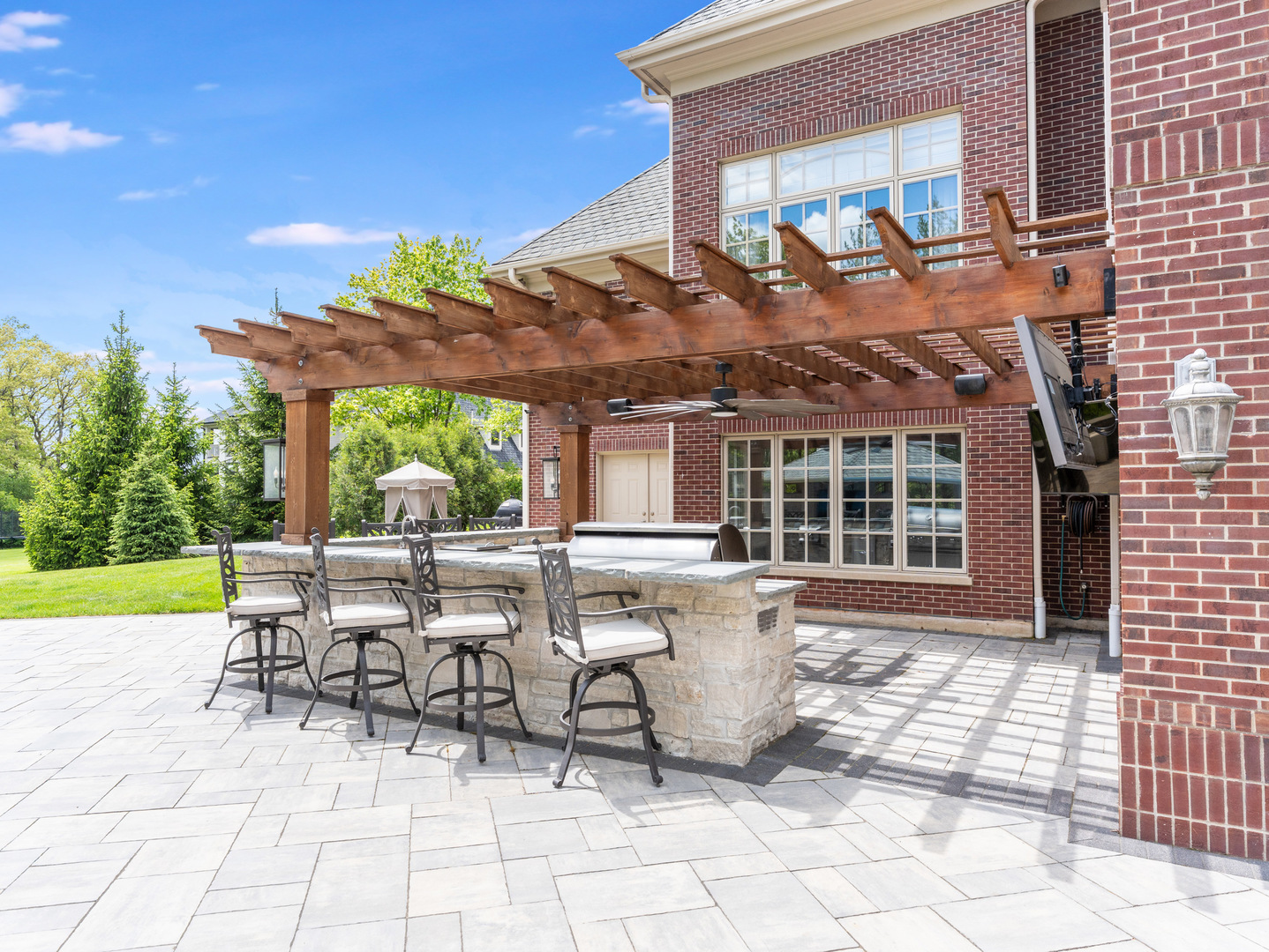 4N881 Old Farm Road St. Charles, IL 60175 - Photo 43 of 66 a view of a patio with table and chairs near a yard