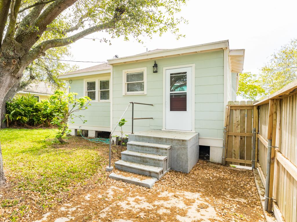 4528 Avenue R 1/2 Galveston, TX 77551 - Photo 7 of 22 a view of a house with backyard and sitting area