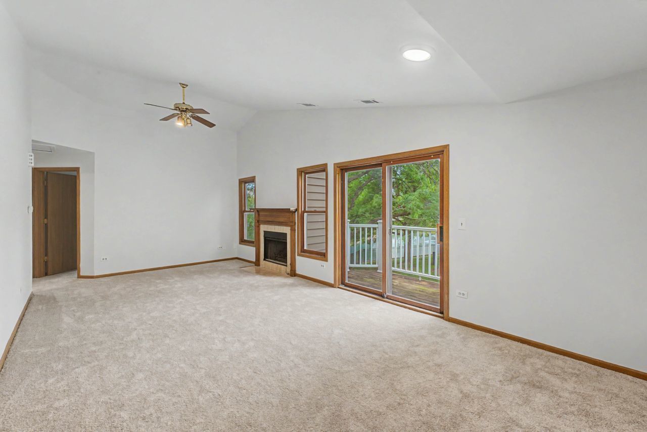 1953 North Coldspring Road Arlington Heights, IL 60004 - Photo 8 of 27 a view of empty room with a fireplace
