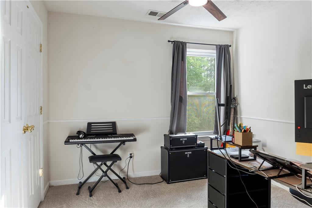 48 Hampton Drive Cartersville, GA 30121 - Photo 23 of 29 a work room with furniture and a window