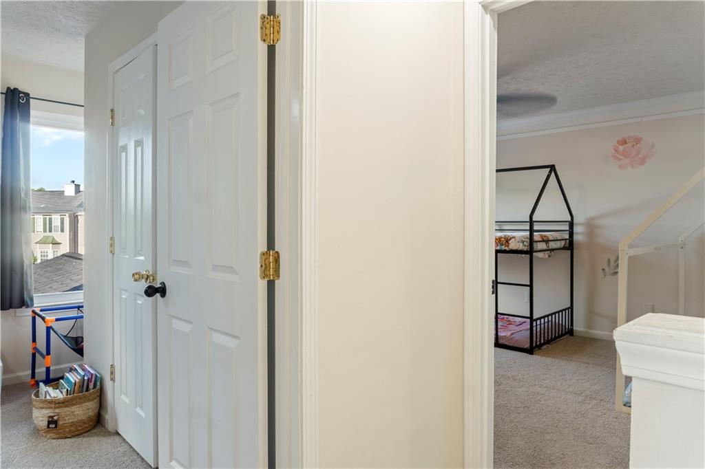 48 Hampton Drive Cartersville, GA 30121 - Photo 24 of 29 a view of a hallway with a small space and a bathroom