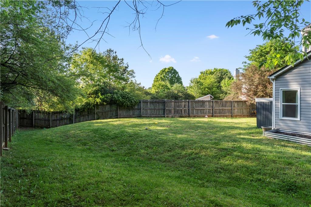 48 Hampton Drive Cartersville, GA 30121 - Photo 27 of 29 a view of a backyard with a garden