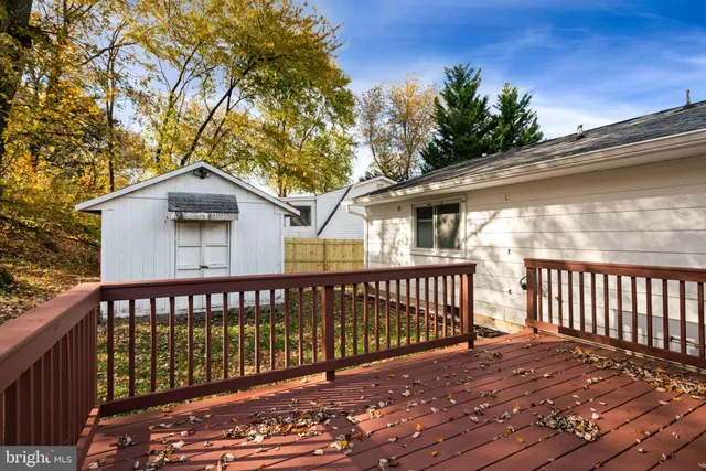 a view of a wooden roof deck