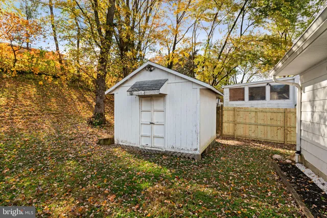 a house with trees in front of it
