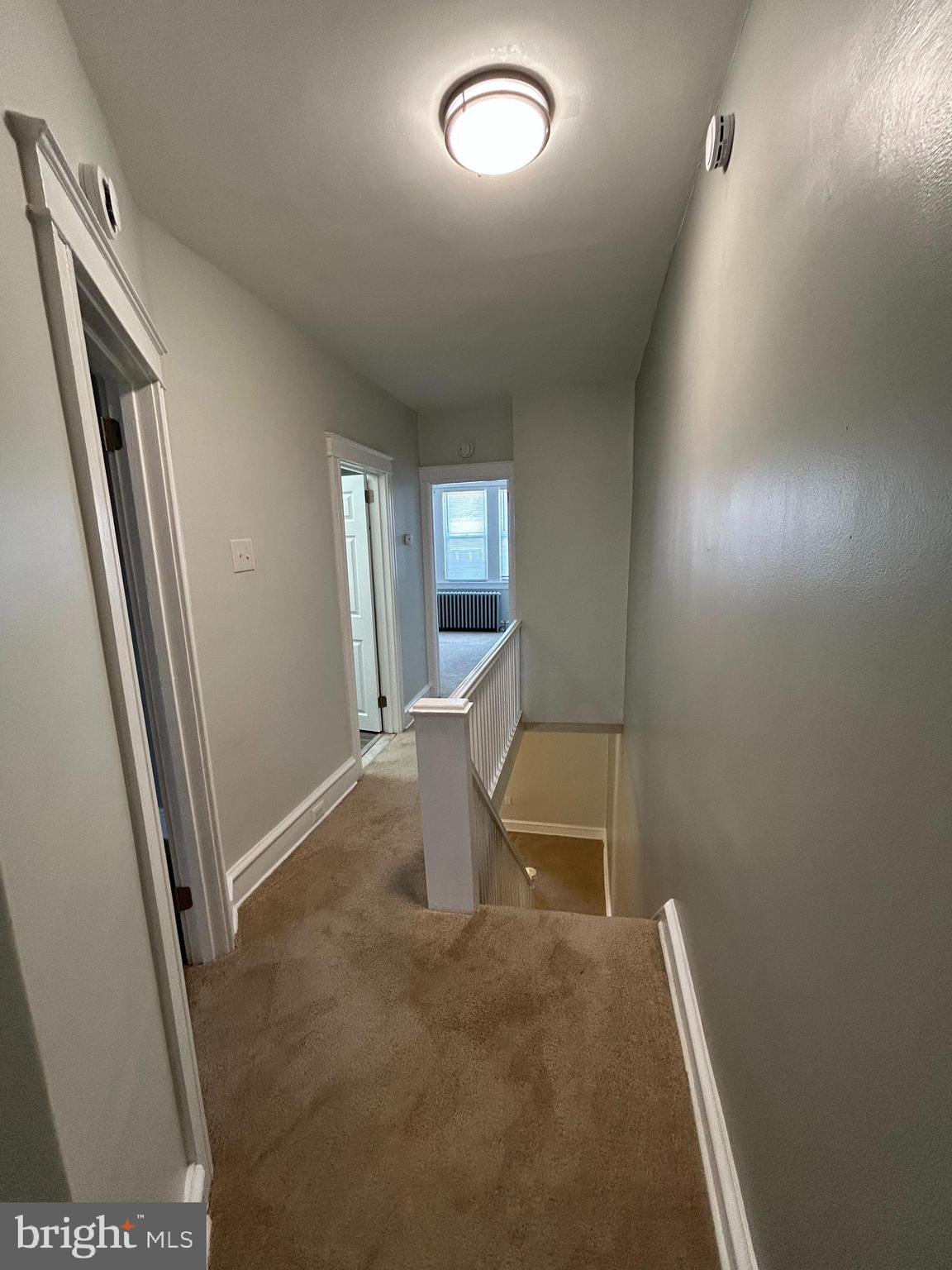 46 Lamport Road Upper Darby, PA 19082 - Photo 17 of 33 view of a livingroom with wooden floor and chair
