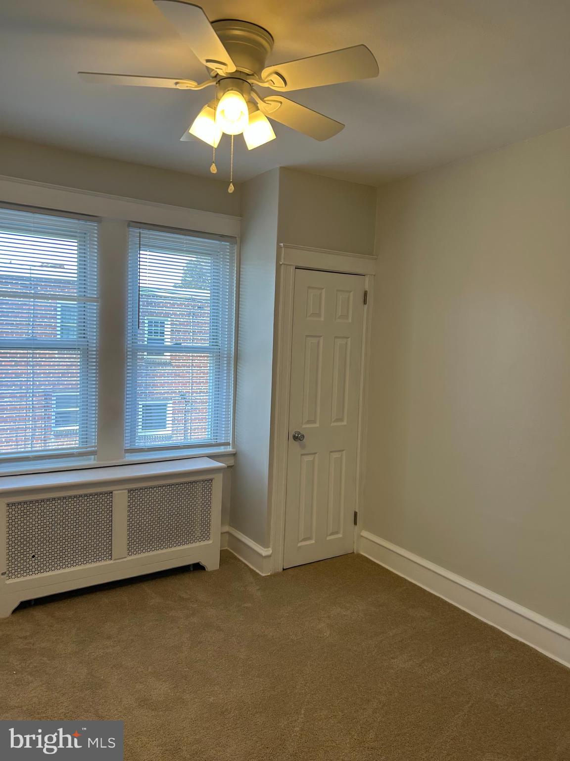 46 Lamport Road Upper Darby, PA 19082 - Photo 23 of 33 an empty room with windows and fan
