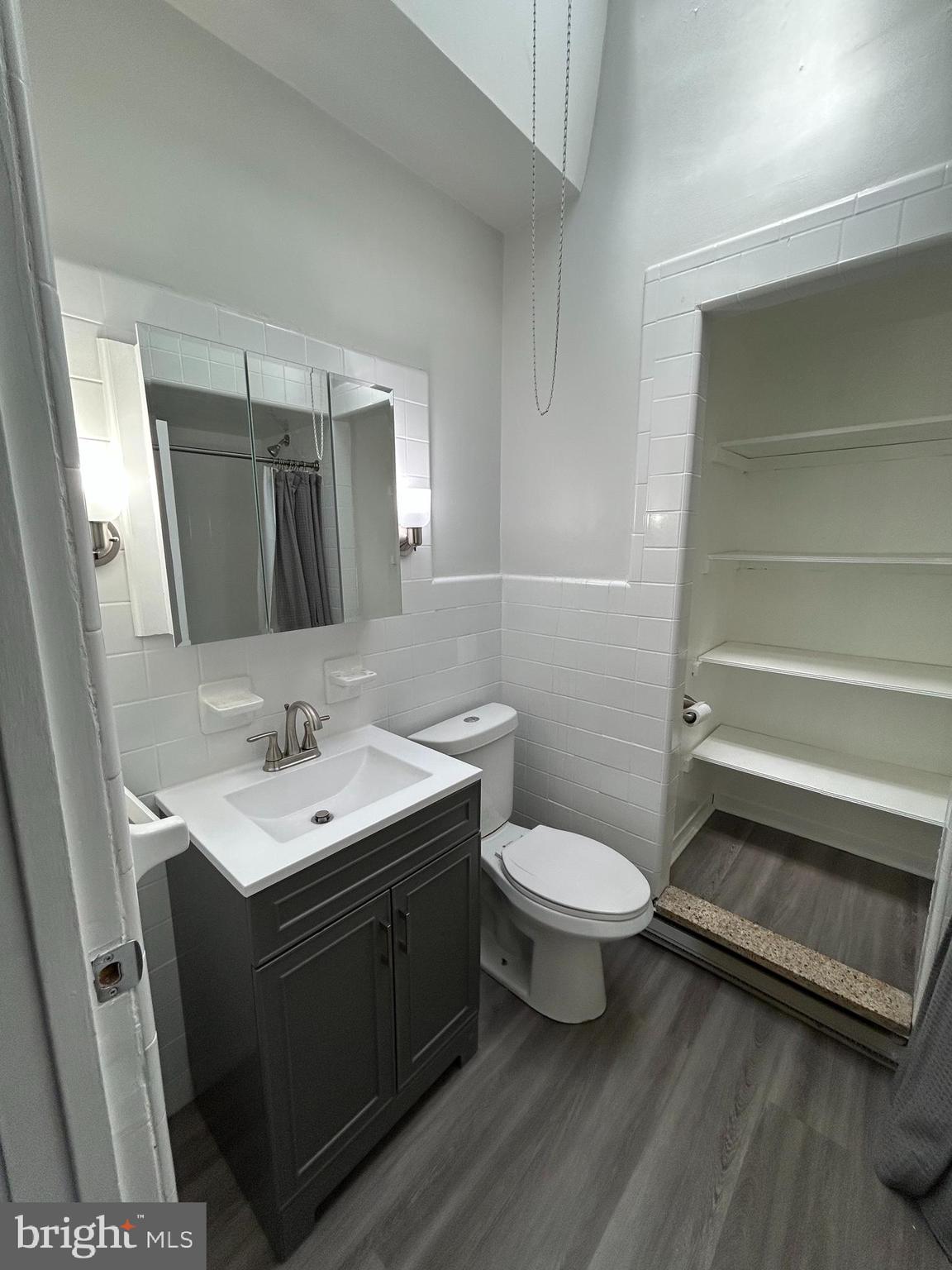46 Lamport Road Upper Darby, PA 19082 - Photo 25 of 33 a bathroom with a toilet sink and mirror