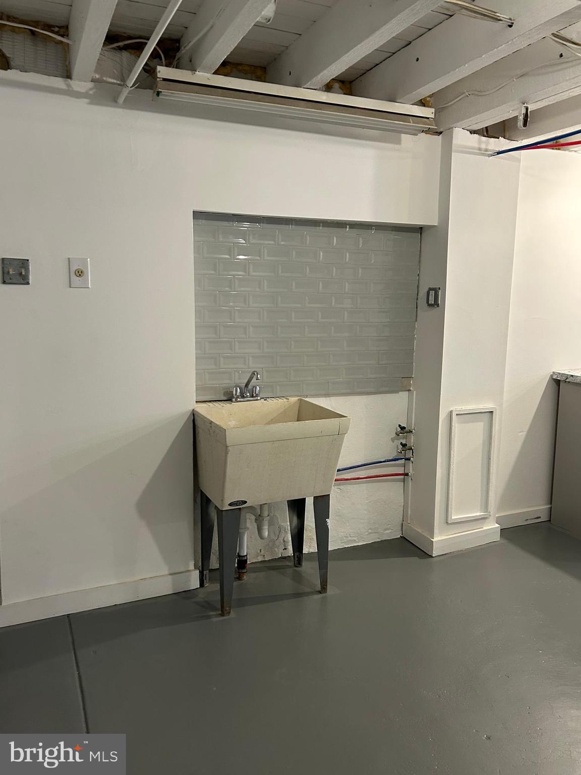 46 Lamport Road Upper Darby, PA 19082 - Photo 30 of 33 a bathroom with a sink and a bathtub