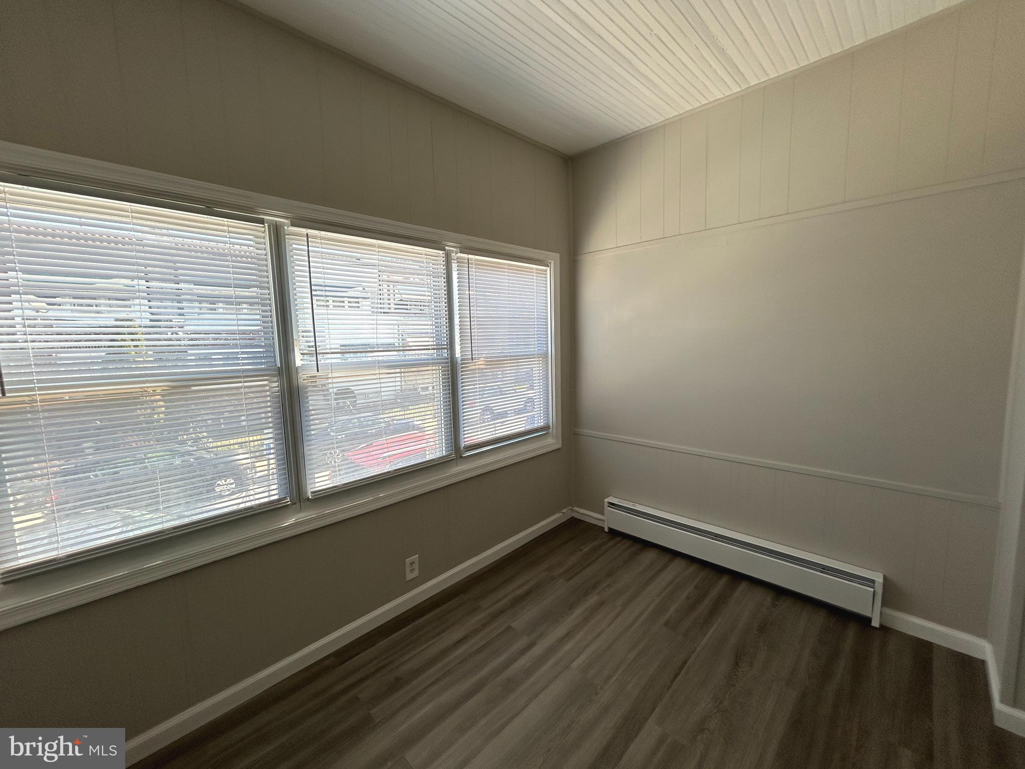 46 Lamport Road Upper Darby, PA 19082 - Photo 5 of 33 a view of a room with wooden floor and windows
