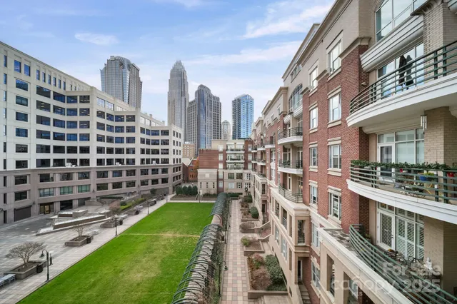 a view of a city with tall buildings