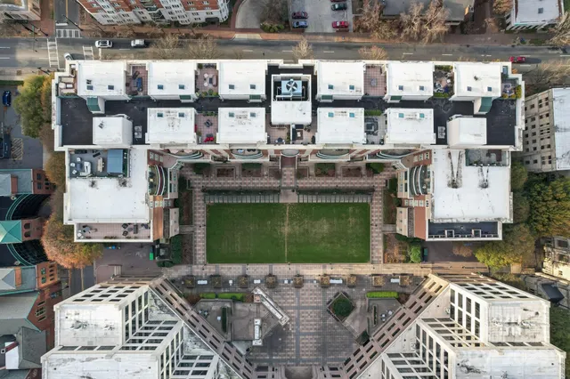 a front view of a houses with outdoor seating