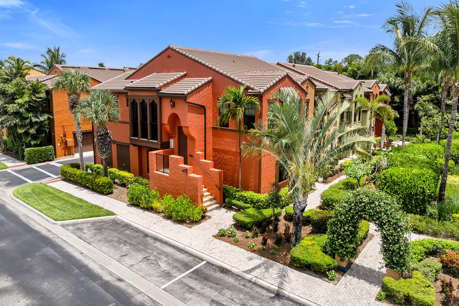 9066 Albion Lane North, Unit 5101 Naples, FL 34113 - Photo 45 of 48 a front view of a house with a yard