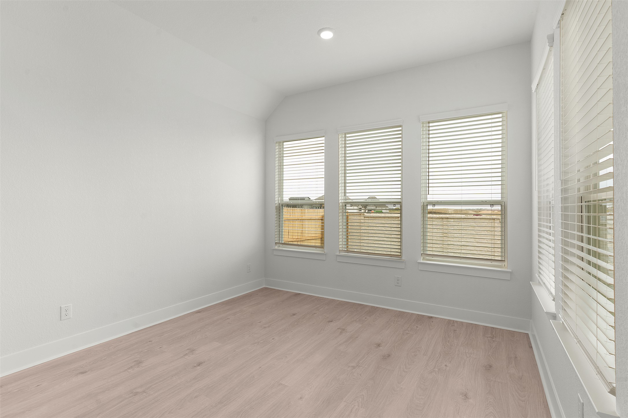 17316 Hope Bergman Road Pflugerville, TX 78660 - Photo 16 of 39 an empty room with windows