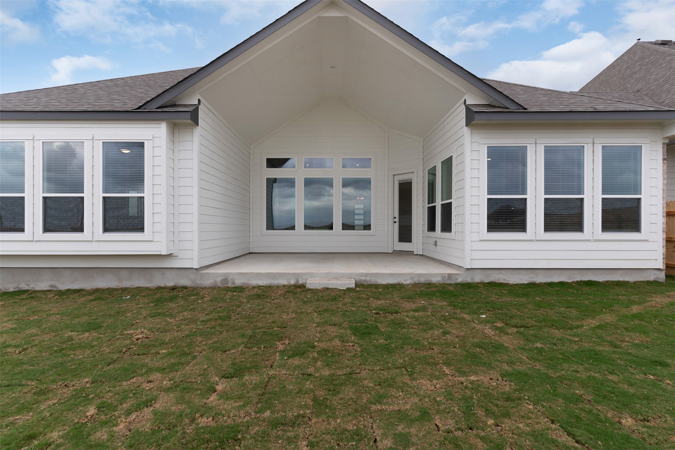 17316 Hope Bergman Road Pflugerville, TX 78660 - Photo 32 of 39 a front view of a house with a garden