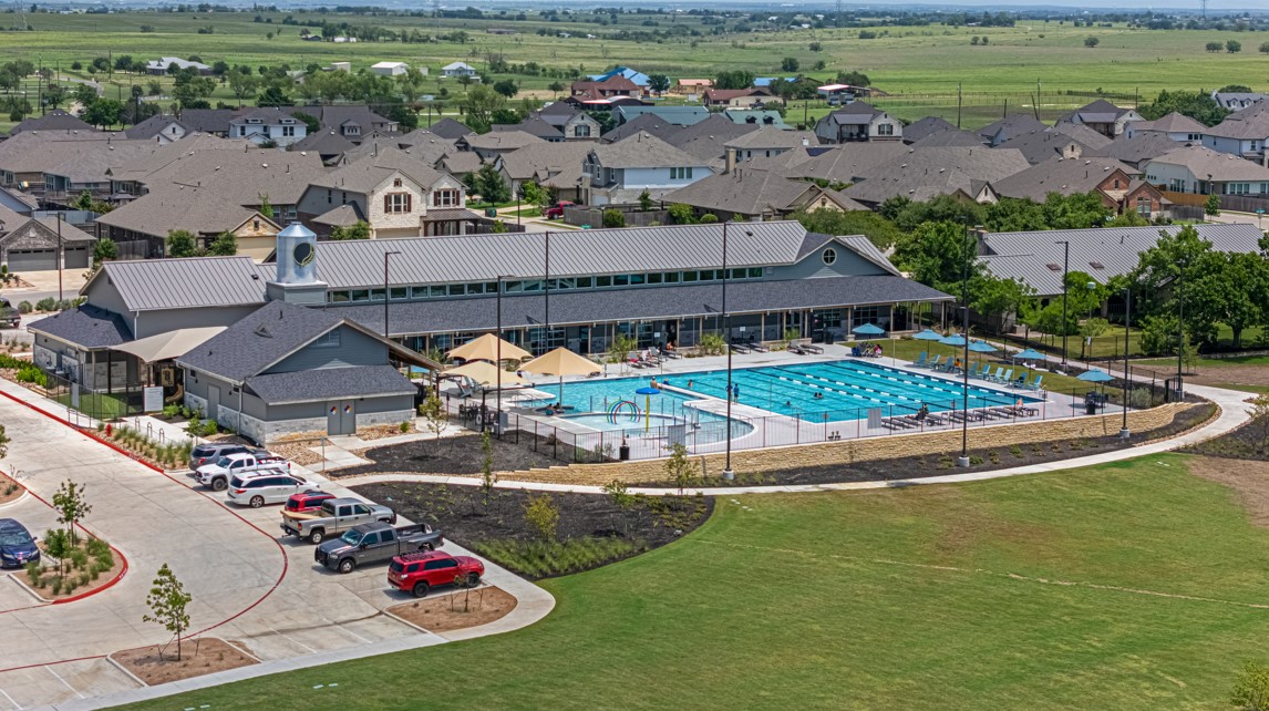 17316 Hope Bergman Road Pflugerville, TX 78660 - Photo 36 of 39 an aerial view of a house with a garden and lake view