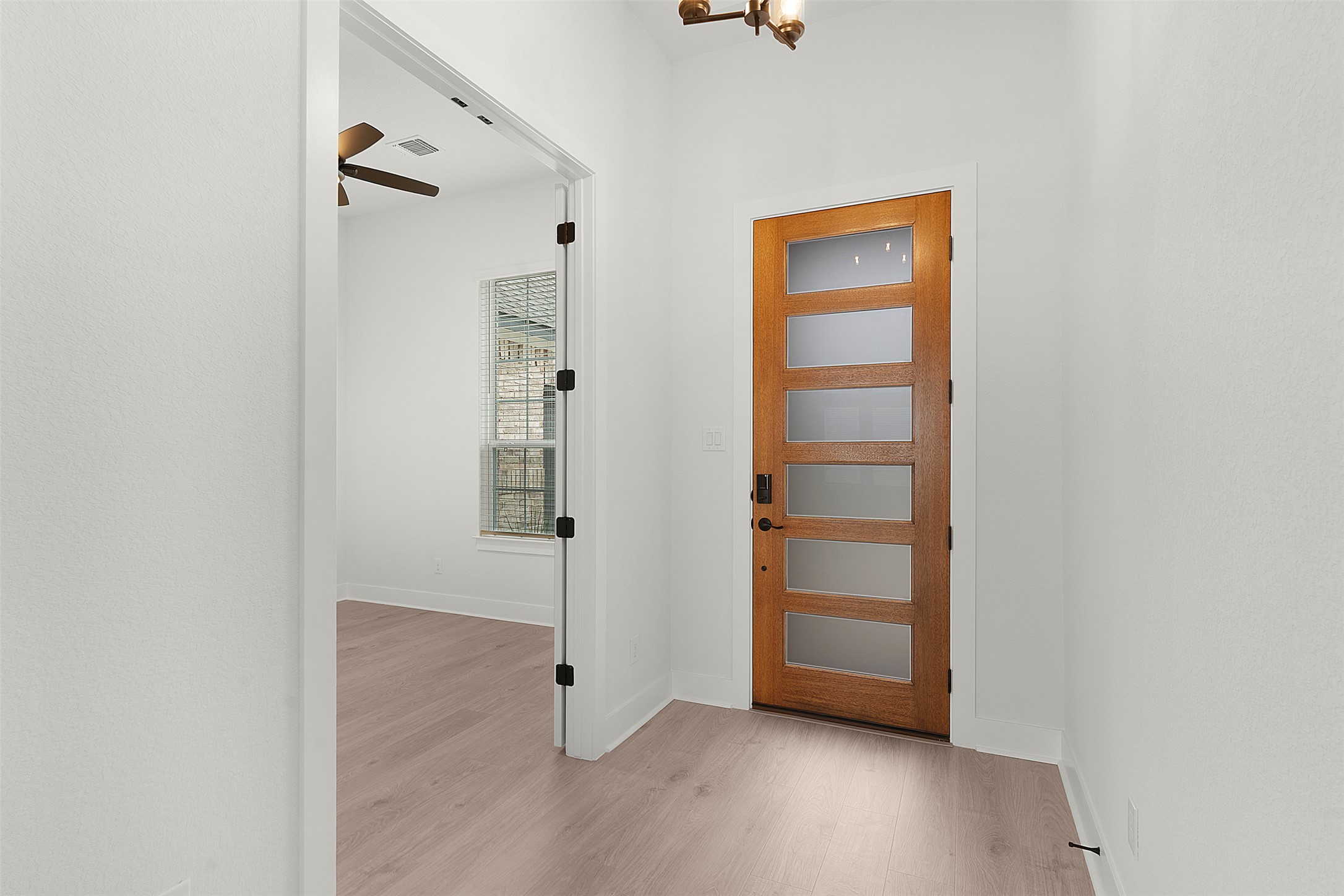 17316 Hope Bergman Road Pflugerville, TX 78660 - Photo 5 of 39 a view of an empty room