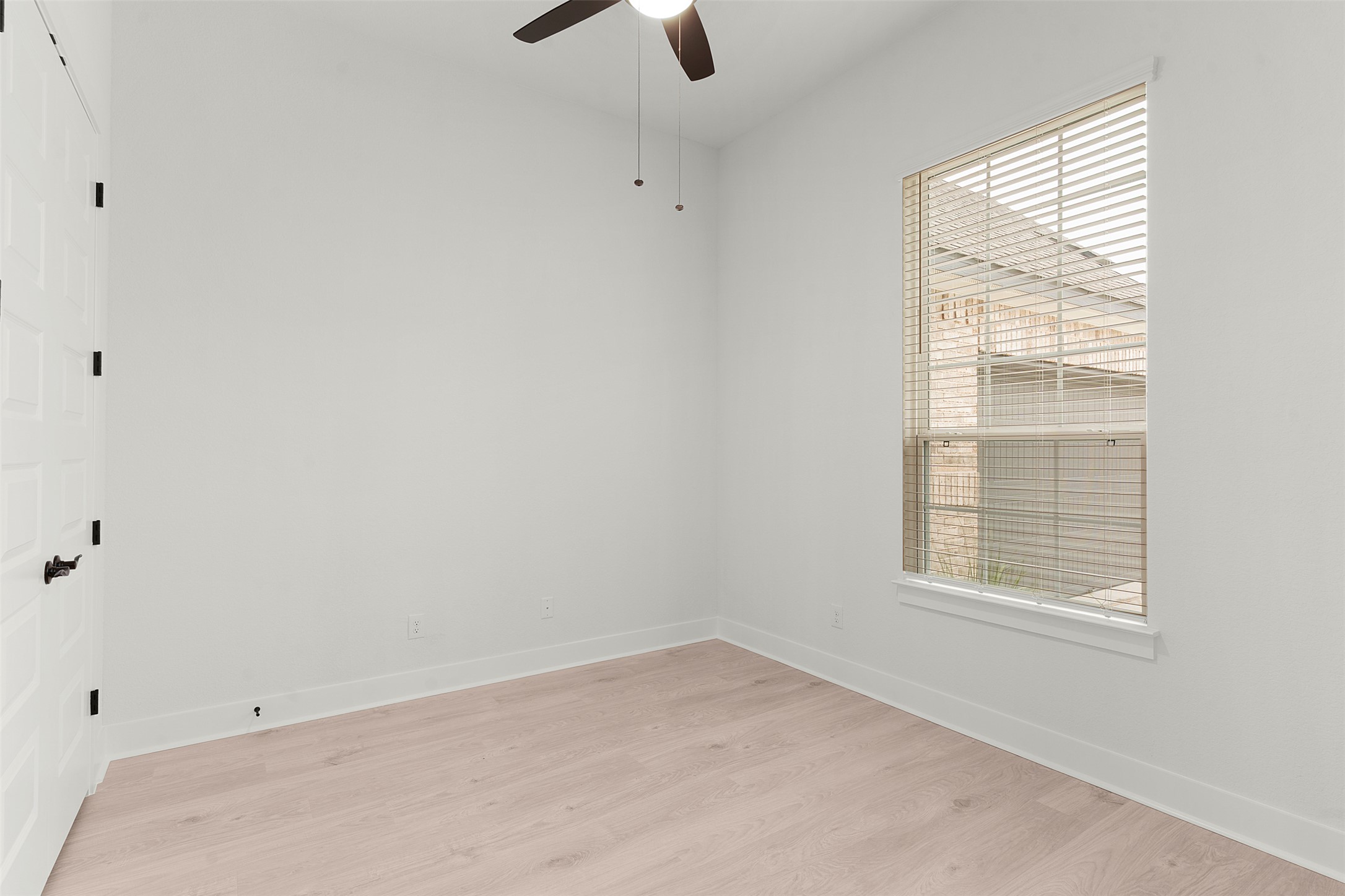 17316 Hope Bergman Road Pflugerville, TX 78660 - Photo 6 of 39 an empty room with windows