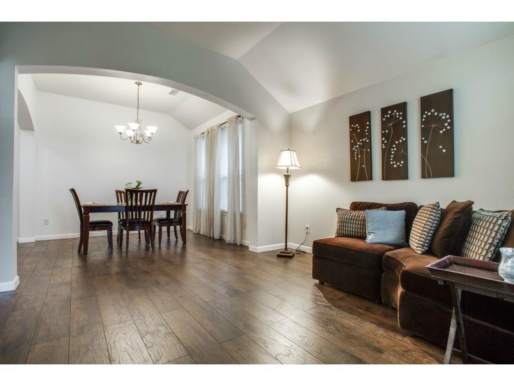 1100 Baker Street McKinney, TX 75069 - Photo 13 of 18 a living room with furniture and wooden floor