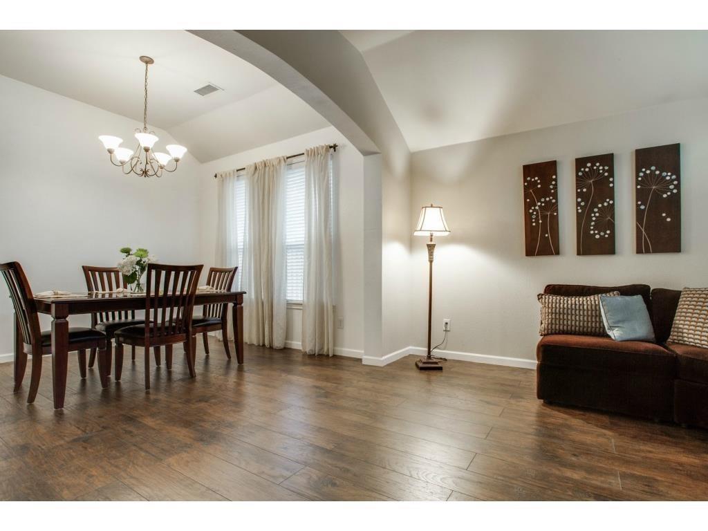 1100 Baker Street McKinney, TX 75069 - Photo 3 of 18 a living room with furniture and a wooden floor