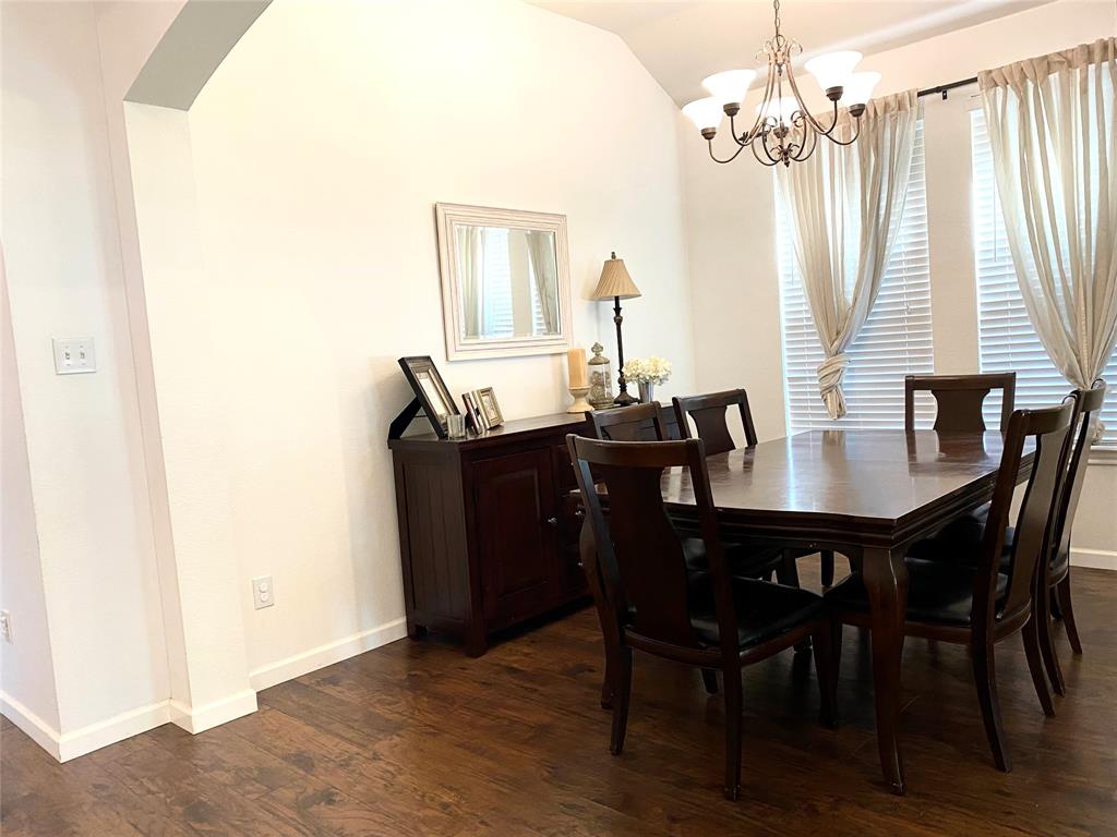 1100 Baker Street McKinney, TX 75069 - Photo 5 of 18 a view of a dining room with furniture and window