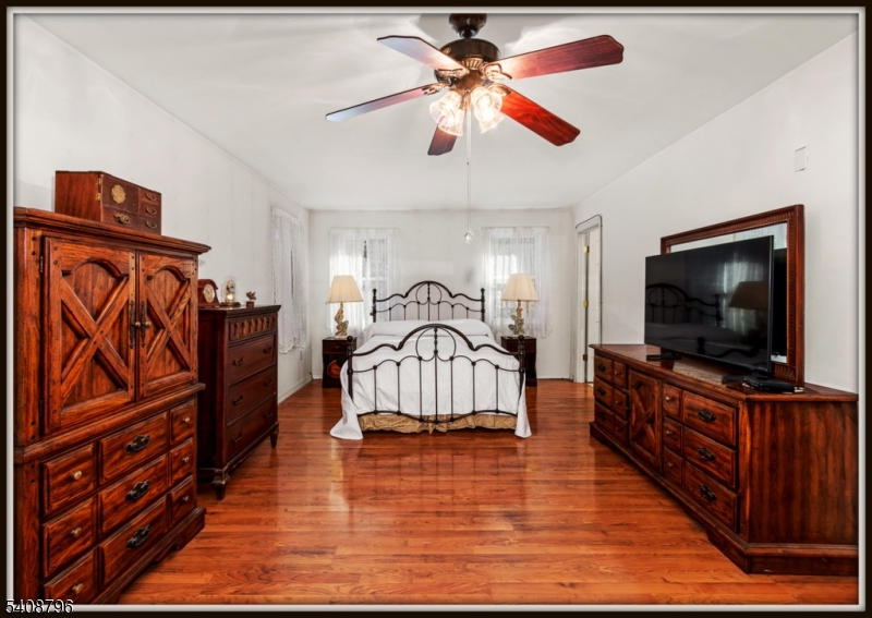 3 Sleepy Hollow Road Newton, NJ 07860 - Photo 11 of 25 a living room with furniture and a flat screen tv