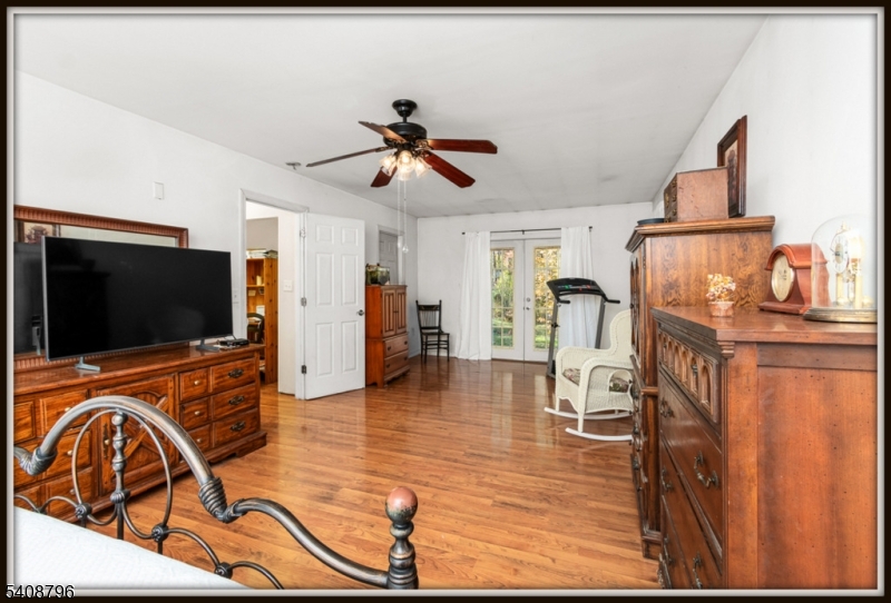 3 Sleepy Hollow Road Newton, NJ 07860 - Photo 13 of 25 a view of a livingroom with furniture and a flat screen tv