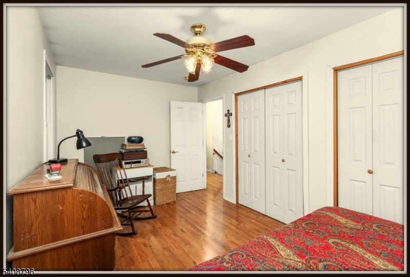 3 Sleepy Hollow Road Newton, NJ 07860 - Photo 18 of 25 a bedroom with a bed and wooden floor