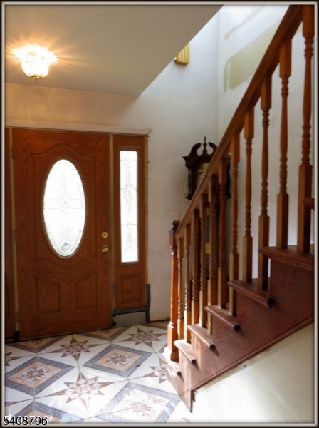 3 Sleepy Hollow Road Newton, NJ 07860 - Photo 5 of 25 a view of a livingroom with stairs
