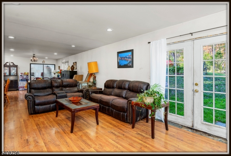 3 Sleepy Hollow Road Newton, NJ 07860 - Photo 7 of 25 a living room with furniture and a wooden floor