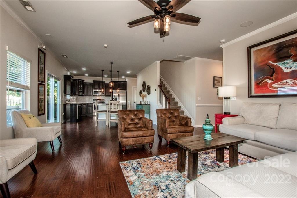 107 East Neel Ranch Road Mooresville, NC 28115 - Photo 12 of 48 a living room with furniture and wooden floor
