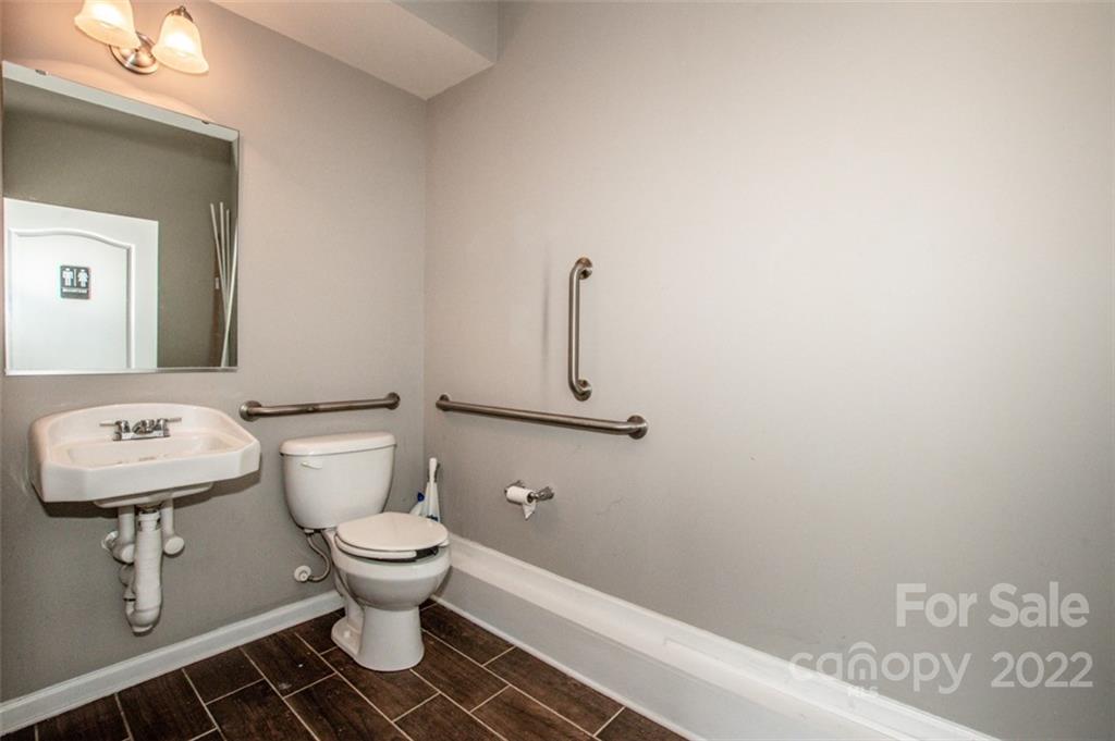 107 East Neel Ranch Road Mooresville, NC 28115 - Photo 23 of 48 a bathroom with a toilet and a sink