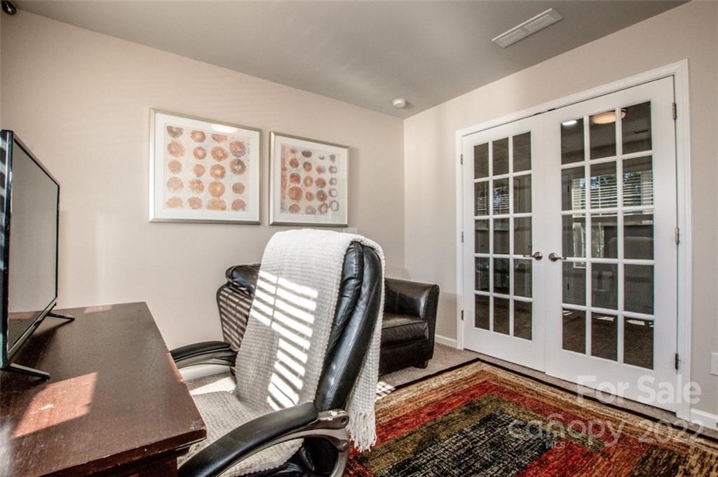 107 East Neel Ranch Road Mooresville, NC 28115 - Photo 35 of 48 a view of a workspace with furniture and a window