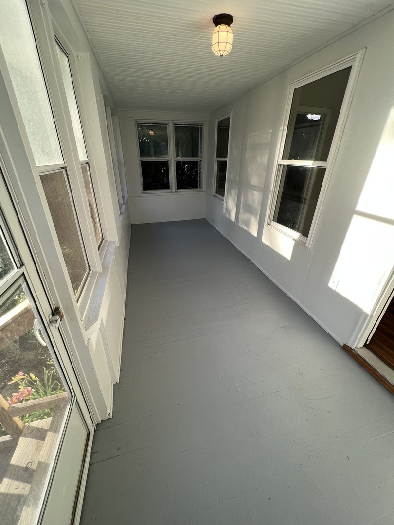 903 North Main Street Rochelle, IL 61068 - Photo 4 of 17 a view of an empty room and a window