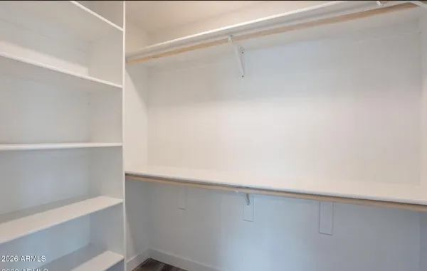 a view of small space with racks on the wall