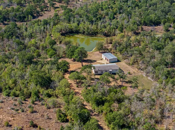a view of a lake with a house
