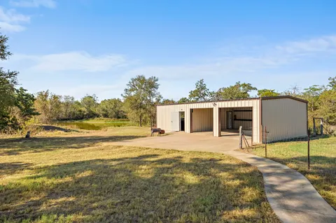 a house with trees in the background