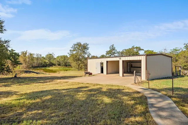 a house with trees in the background
