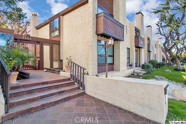 1244 Valley View Road, Unit 102 Glendale, CA 91202 - Photo 1 of 1 a view of a building with a porch