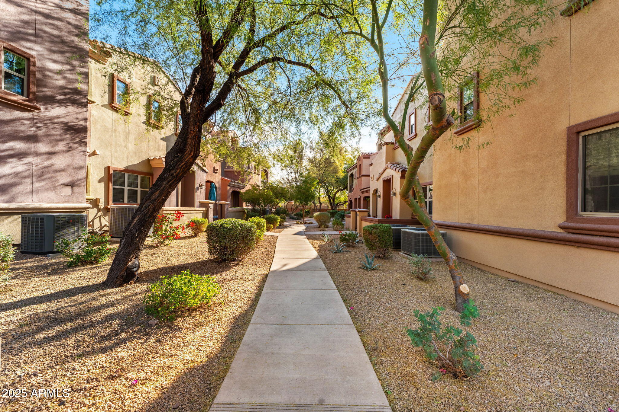 3935 East Rough Rider Road, Unit 1235 Phoenix, AZ 85050 - Photo 2 of 52 a view of outdoor space with seating