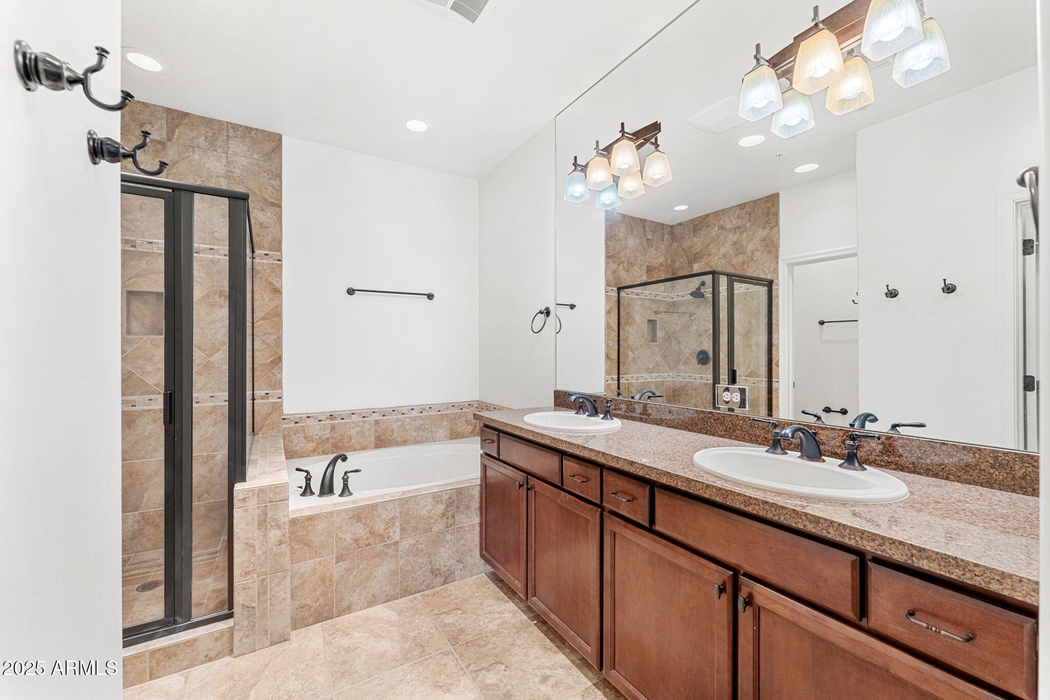 3935 East Rough Rider Road, Unit 1235 Phoenix, AZ 85050 - Photo 31 of 52 a spacious bathroom with a tub sink and a mirror
