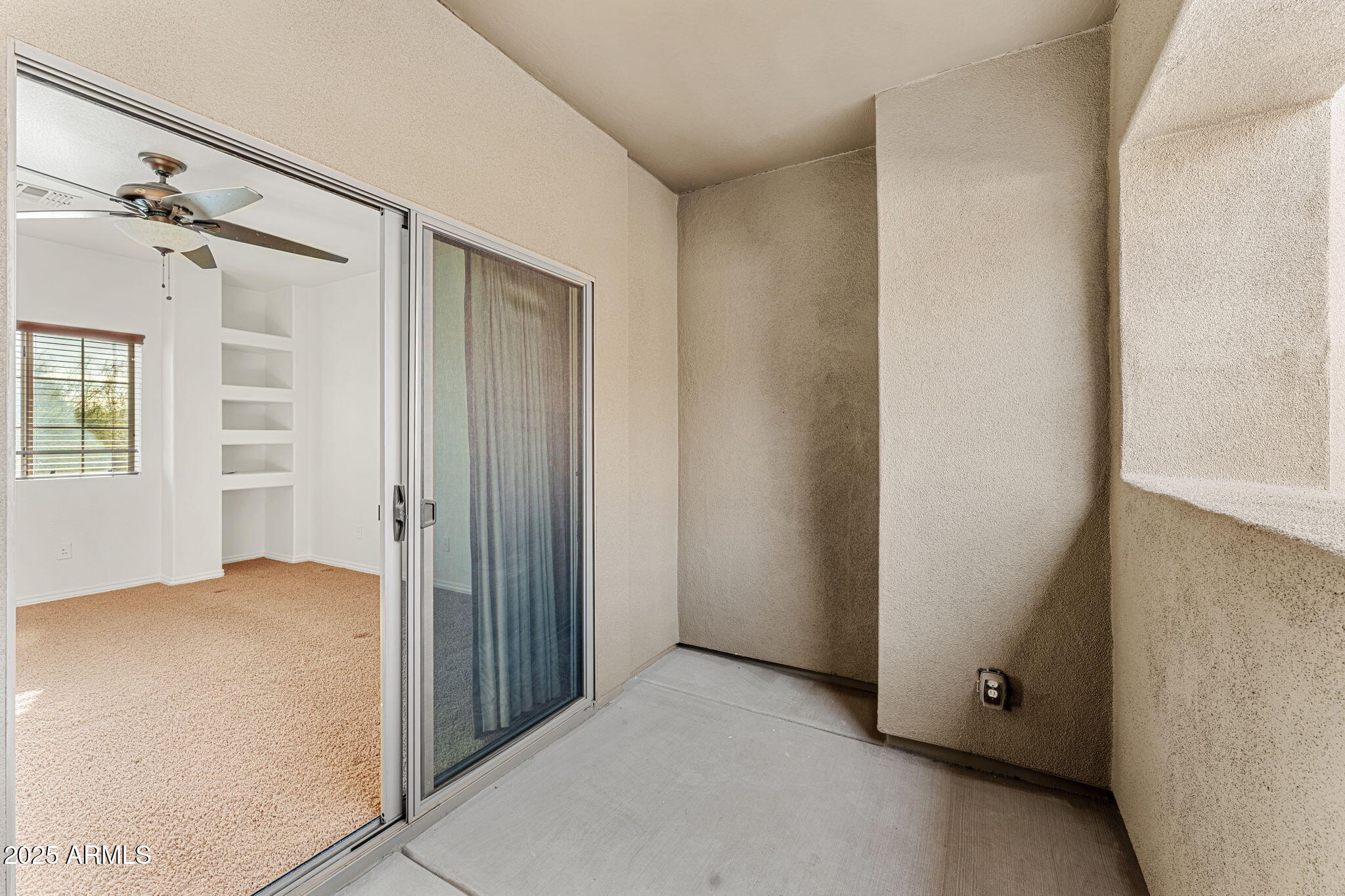 3935 East Rough Rider Road, Unit 1235 Phoenix, AZ 85050 - Photo 38 of 52 an empty room with windows