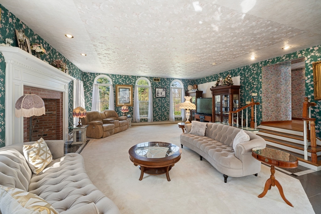175 Pleasant Street Upton, MA 01568 - Photo 16 of 41 a living room with furniture and a large window