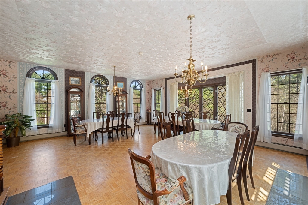 175 Pleasant Street Upton, MA 01568 - Photo 17 of 41 a dining room with furniture window wooden floor